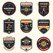 Set of retro vintage workshop badges and label graphics.