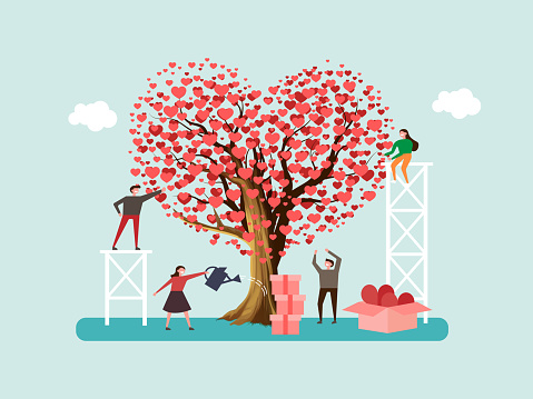 Volunteers grown tree of love and send out care, hearts to people. Team help charity and sharing hope. Valentine's day.