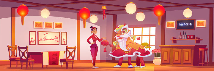 Waitress and New Year Lion in chinese restaurant