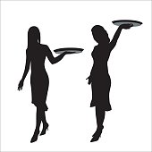 A vector silhouette illustration of waitresses carrying trays.  They wear high heels and dressed.