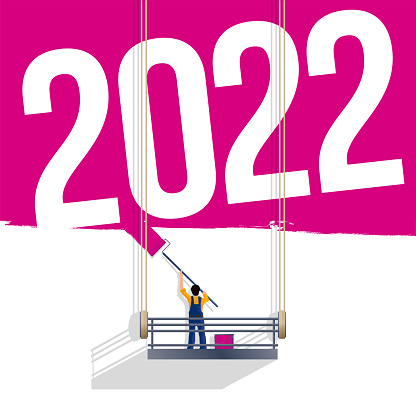 A wall painted in fluorescent pink to communicate and present the year 2022.