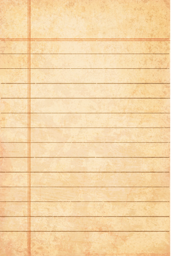 Weathered lined paper that is yellow
