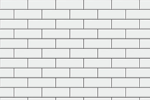 Ceramic or earthenware modern white tiles.Brick wall of the building. Decor for subway, home itterier bath and kitchen.