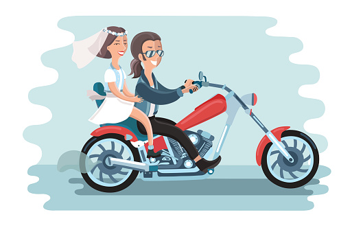 Wedding young couple riding the motorcycle