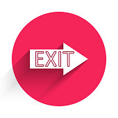 istock White Fire exit icon isolated with long shadow. Fire emergency icon. Red circle button. Vector Illustration 1266092175