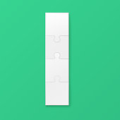 White four piece jigsaw puzzle template - blank realistic mockup in small rectangle shape with 4 pieces isolated on green background. Vector illustration.