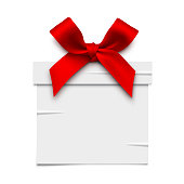 Vector illustration of a white gift box sticker with red bow. Place for text.