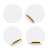 White glued round stickers with golden back side curling set. 3d circular shaped blank paper labels vector illustration. Badges with shining peel effect.