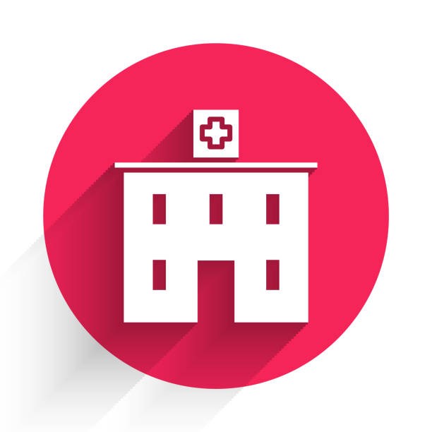 White Medical hospital building with cross icon isolated with long shadow. Medical center. Health care. Red circle button. Vector Illustration White Medical hospital building with cross icon isolated with long shadow. Medical center. Health care. Red circle button. Vector Illustration hospital building stock illustrations