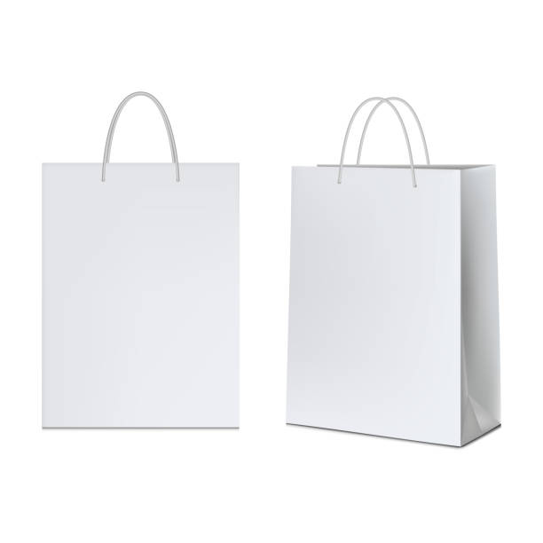 白い背景に隔離された白い紙袋。 - 買い物袋点のイラスト素材／クリップアート素材／マンガ素材／アイコン素材