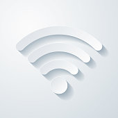 istock Wifi. Icon with paper cut effect on blank background 1323335170