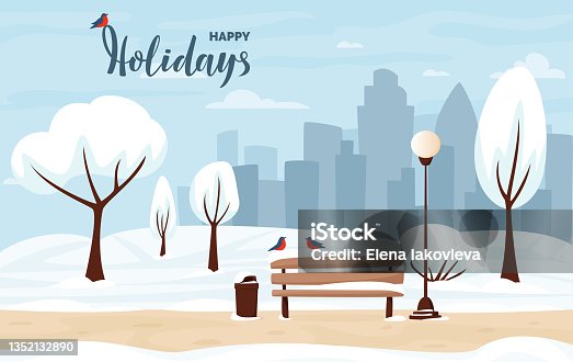 istock Winter city park with snow and city silhouette. 1352132890