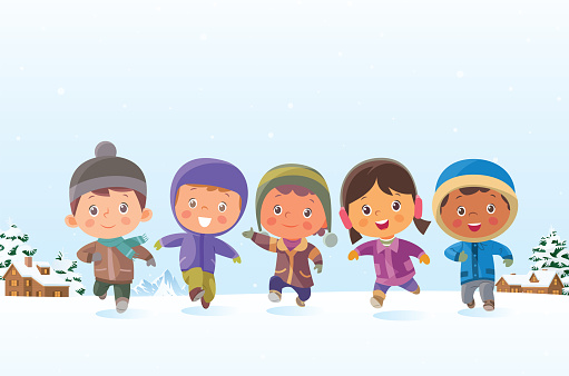 Winter landscape. Cheerful kids running on the snow. They are smiling while looking at the camera.
