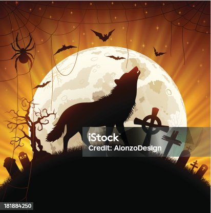 istock Wolf howling at the moon 181884250