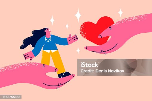 istock Woman and heart in hands showing support 1362756335