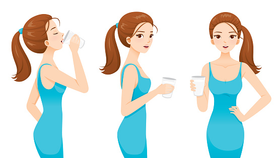 Woman Drinking Milk For Health. Good Shape Woman In Blue Dress.