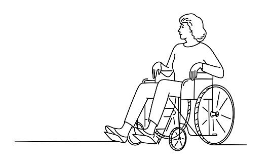 Woman in a wheelchair.