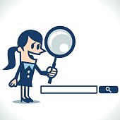 istock Woman searching with magnifying glass 478306604