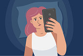 istock A woman with a phone in bed, addicted to gadgets. Overuse of screen time. 1309301895