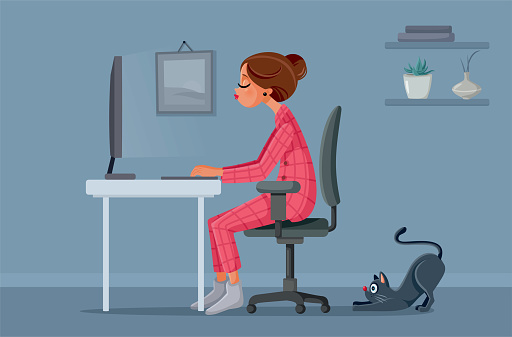 Woman Working Remotely from Home next to her Cat