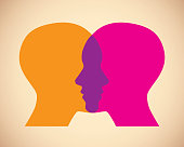 Vector illustration of two orange and pink women's faces against a tan background in flat style.