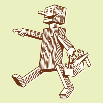 Wooden Robot Carrying a Toolbox