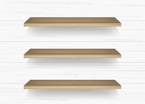 Wooden shelf on white wall background with soft shadow.