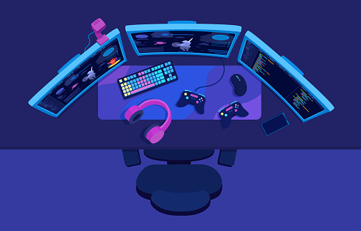 A workspace desktop of a gamer, video game streamer. Three computer monitors on a PC desk. Gaming accessories flat lay.