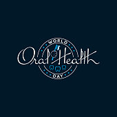 Stamp-shaped World Oral Health Day calligraphic lettering on black background. Dental logo design.