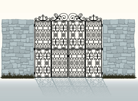 Wrought-iron gate and stone wall