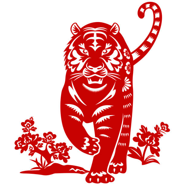 赤い色の紙のカットで虎の年を祝い、虎は中国の旧正月2022のための中国の干支です