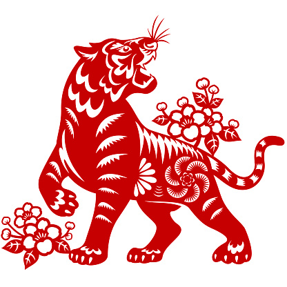 Celebrate the Year of the Tiger with the red colored paper cut, and the tiger is the Chinese Zodiac sign for the Chinese New Year 2022