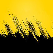 Abstract black and yellow background with grunge tire tracks