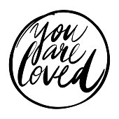You are loved lettering. Vector brush calligraphy isolated on white background.