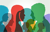 Colourful overlapping silhouettes of head profiles.