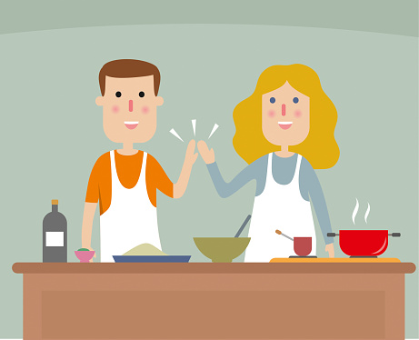 Young couple cooking dinner
