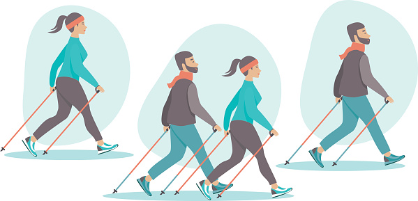 Young couple making nordic walking training together