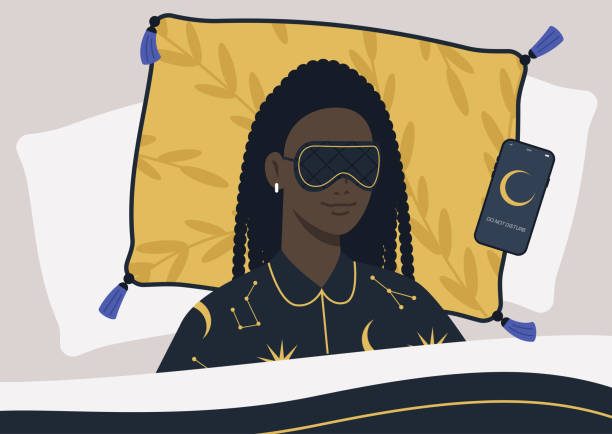 A young female Black character wearing a night mask and silk pajamas in bed, a mobile phone on silent mode next to them on a pillow A young female Black character wearing a night mask and silk pajamas in bed, a mobile phone on silent mode next to them on a pillow bedroom silhouettes stock illustrations
