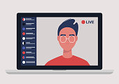 Young male blogger holding a live streaming online event, website interface