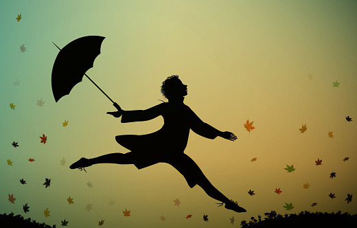 young men jumps and holding the umbrella, autumn rush time, jumping for joy,
