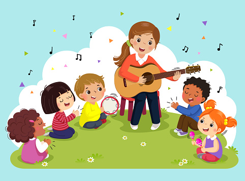 Young woman playing guitar with a group of kids singing and playing musical instruments. Female teacher and pupils having music in the park.