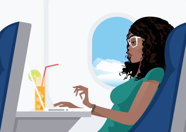 Young woman travelling by plane African-American young woman travelling by plane, using her laptop while flying plane window seat stock illustrations