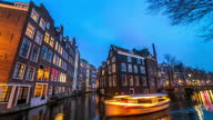 istock 4k Time Lapse : Amsterdam Canals at twilight 1323432296
