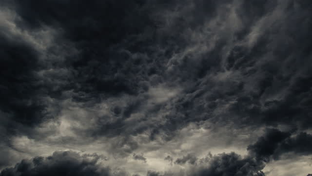 4k time lapse sky with gray clouds before thunderstorm rain. Rainy grey sky.