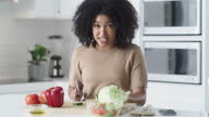 istock 4k video footage of a young woman recording herself making a healthy meal at home 1312859196