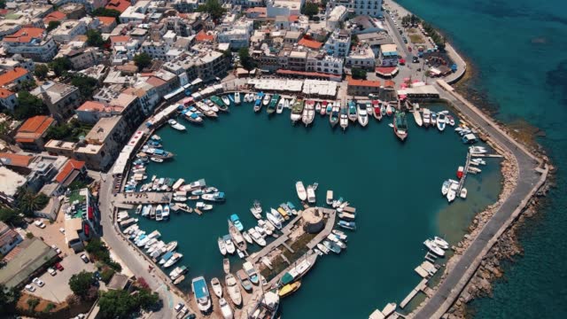Aerial 4k Historical Kyrenia Harbour with medieval Venetian Castle in North Cyprus