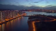 istock Aerial hyperlapse of a residential area on the riverbank at sunset. 1317828067