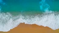 istock Aerial view of clear turquoise sea and waves 1302605901