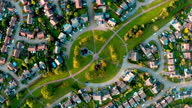 istock Aerial view suburban neighborhood with identical wealthy, Milton Keynes, Furzton 1346887239