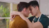 istock Asian attractive male LQBTQ starting foreplay and making love at home. Handsome romantic man gay couple spending leisure time together having sex in dark night room in house. Homosexual-LGBTQ concept. 1363778461
